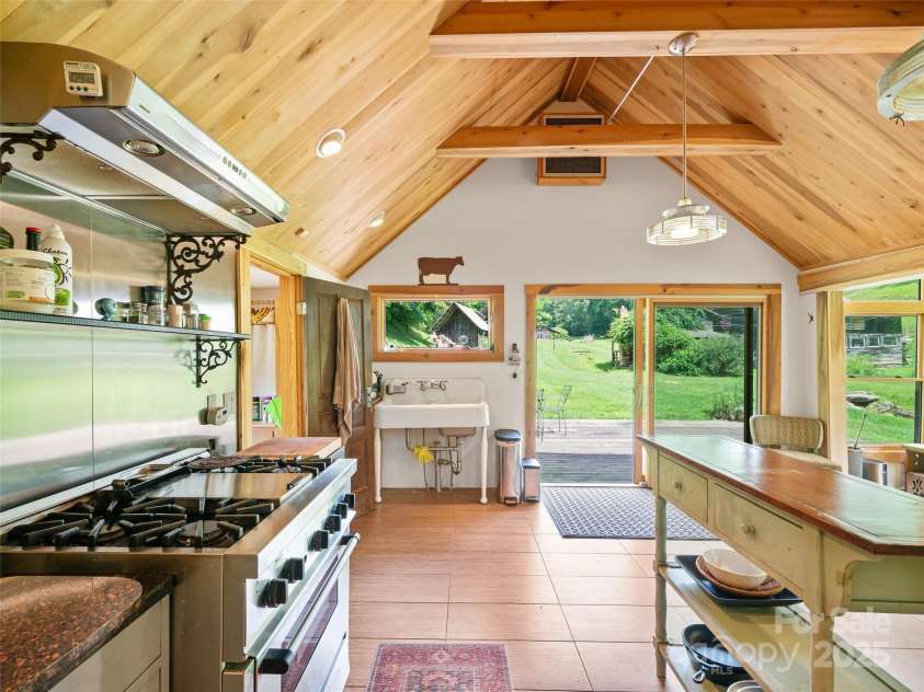 9065 NC 63 Highway, Leicester, NC 28748.  MLS# CAR4286038, YatesRealty ID 28957. Kitchen