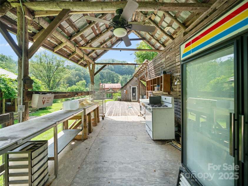 9065 NC 63 Highway, Leicester, NC 28748.  MLS# CAR4286038, YatesRealty ID 28957. Out Door Kitchen