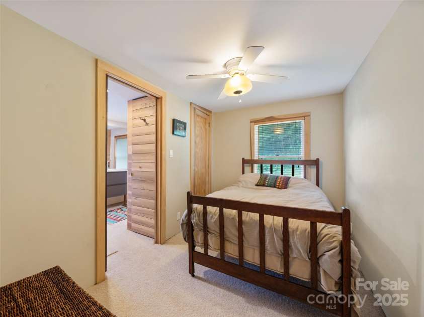 9065 NC 63 Highway, Leicester, NC 28748.  MLS# CAR4286038, YatesRealty ID 28957. Primary Bedroom