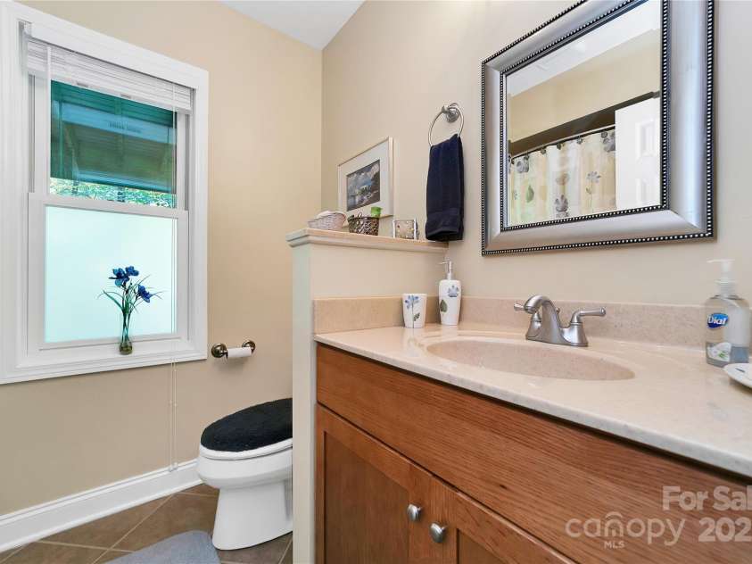 50 Duya Court, Brevard, NC 28712.  MLS# CAR4280810, YatesRealty ID 2896. Lower Level Bath