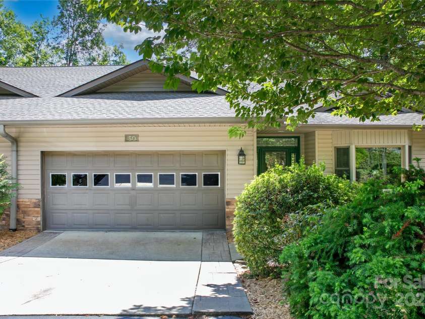 50 Duya Court, Brevard, NC 28712.  MLS# CAR4280810, YatesRealty ID 2896. Spacious Qualla Village Home