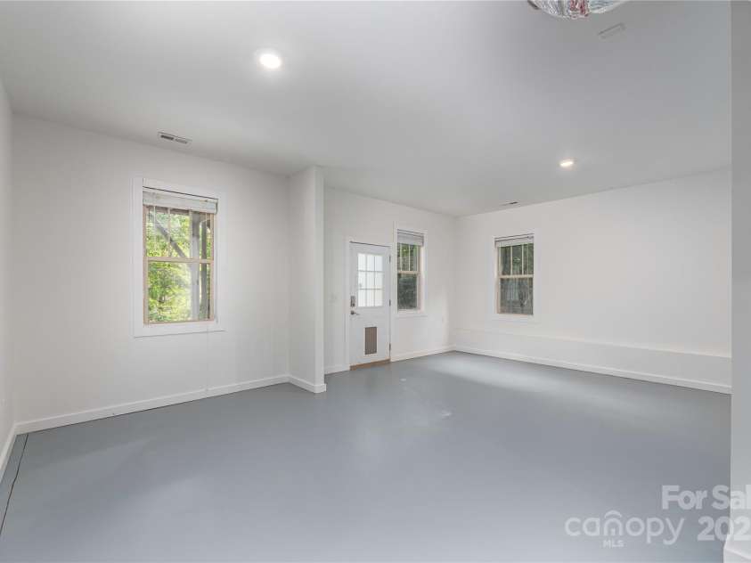 112 Mountain Drive, Biltmore Lake, NC 28715.  MLS# CAR4278930, YatesRealty ID 28972. Basement flex room