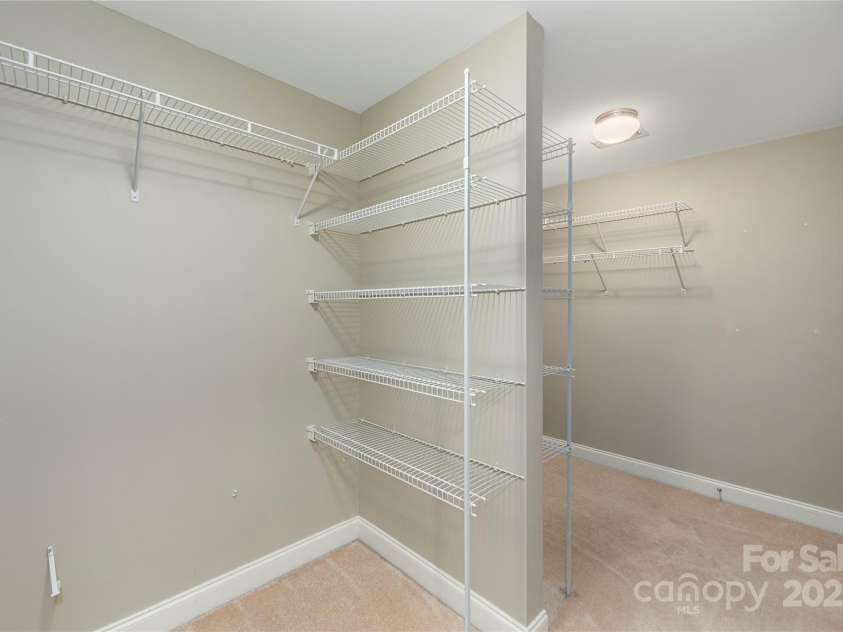 112 Mountain Drive, Biltmore Lake, NC 28715.  MLS# CAR4278930, YatesRealty ID 28972. Primary walk-in closet