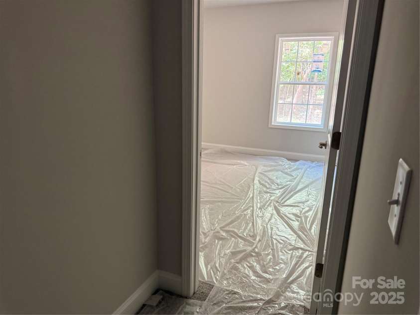 2924 Noritake Trail, Albemarle, NC 28001.  MLS# CAR4259320, YatesRealty ID 2898. Entrance in Basement Bedroom