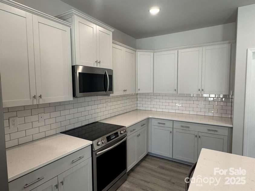 2924 Noritake Trail, Albemarle, NC 28001.  MLS# CAR4259320, YatesRealty ID 2898. Facsimile- Kitchen