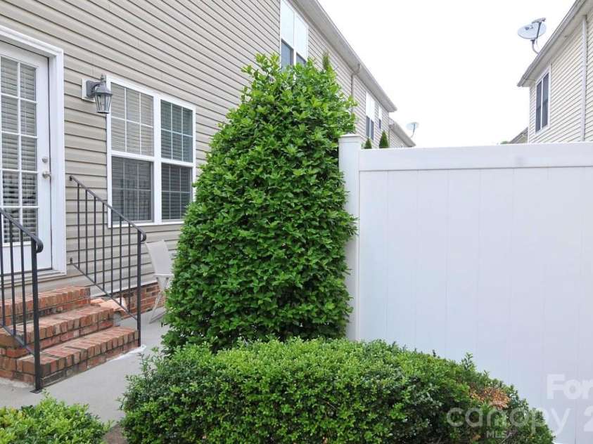 6918 Misty Pine Lane, Charlotte, NC 28217.  MLS# CAR4390936, YatesRealty ID 28980. Back patio