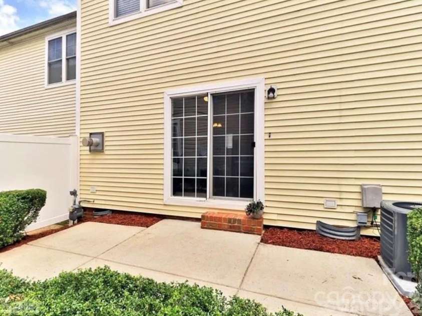 6918 Misty Pine Lane, Charlotte, NC 28217.  MLS# CAR4390936, YatesRealty ID 28980. Back patio area