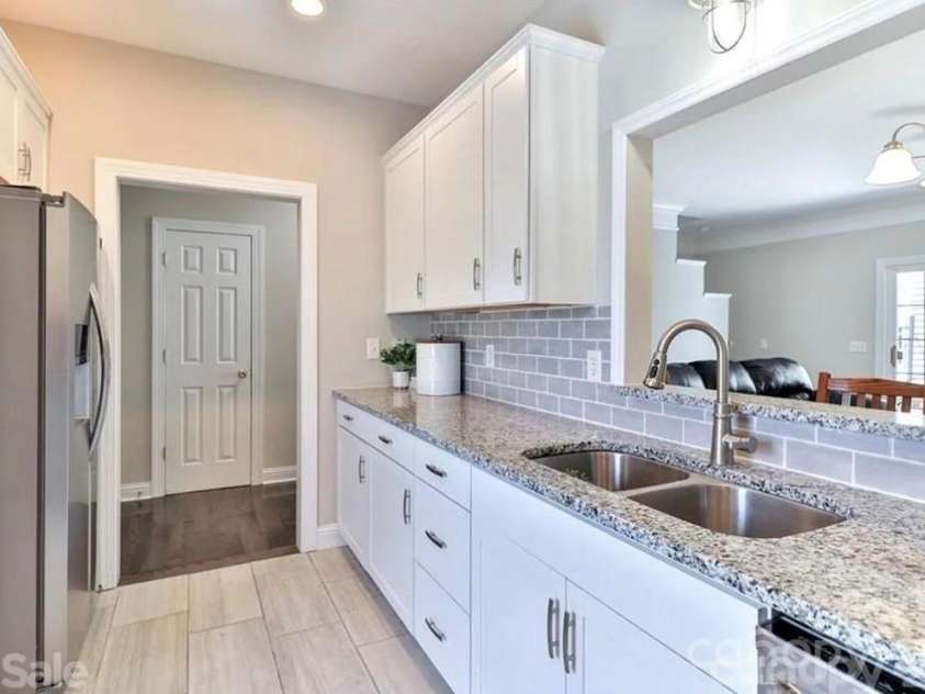 6918 Misty Pine Lane, Charlotte, NC 28217.  MLS# CAR4390936, YatesRealty ID 28980. Kitchen showcasing granite countertops