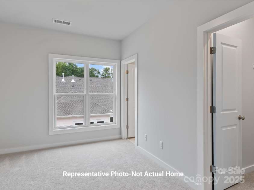 9927 Annsborough Square, Huntersville, NC 28078.  MLS# CAR4284657, YatesRealty ID 28981. Bedroom 2 with full bath and walk-in closet-Berkshire Plan