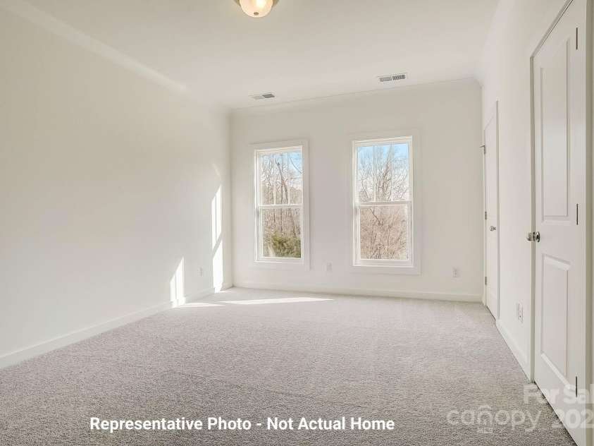 9929 Ansonborough Square, Huntersville, NC 28078.  MLS# CAR4283931, YatesRealty ID 28983. Main Bedroom with 2 closets-Cambridge Plan