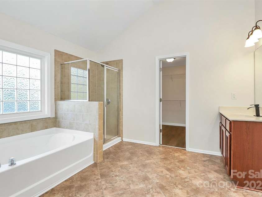 4005 Sedgewick Road, Indian Trail, NC 28079.  MLS# CAR4283444, YatesRealty ID 28988. Primary Owners Bathroom