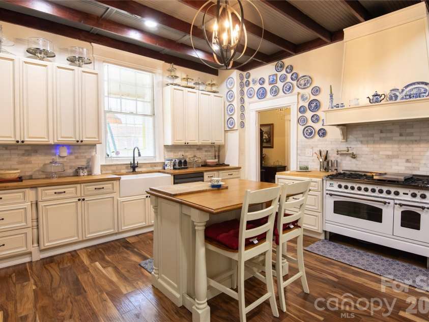 413 Washington Street, Shelby, NC 28150.  MLS# CAR4391145, YatesRealty ID 28990. Spacious kitchen with 48