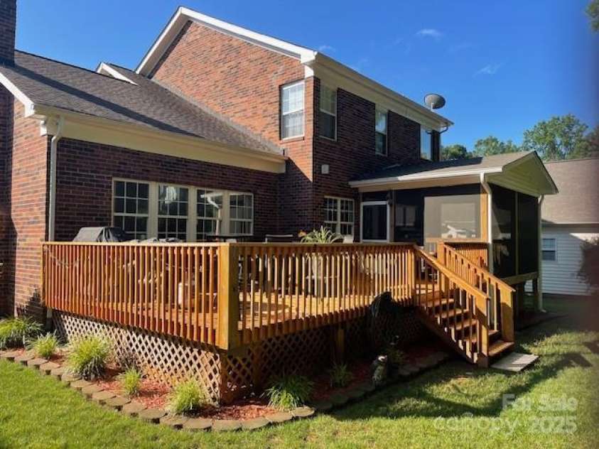 15811 Burlingame Drive, Huntersville, NC 28078.  MLS# CAR4269192, YatesRealty ID 28992. Lots of outdoor fun between screened in porch/deck and back yard
