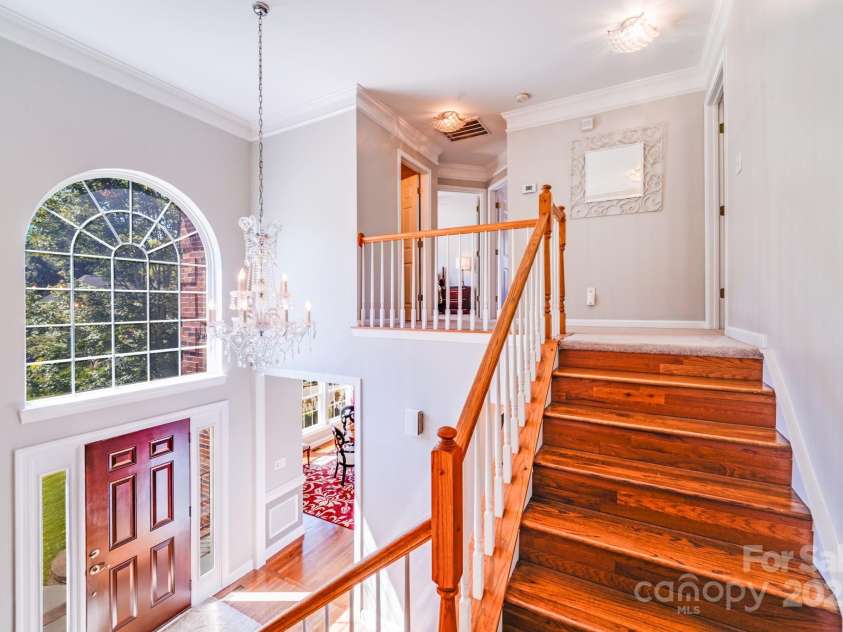 15811 Burlingame Drive, Huntersville, NC 28078.  MLS# CAR4269192, YatesRealty ID 28992. OK NOW LETS GO BACK IN AND GO UPSTAIRS NICE WOOD FLOOR STEPS