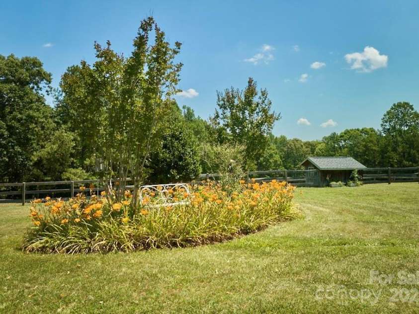 724 Moore Road, Tryon, NC 28782.  MLS# CAR4277996, YatesRealty ID 28997. 