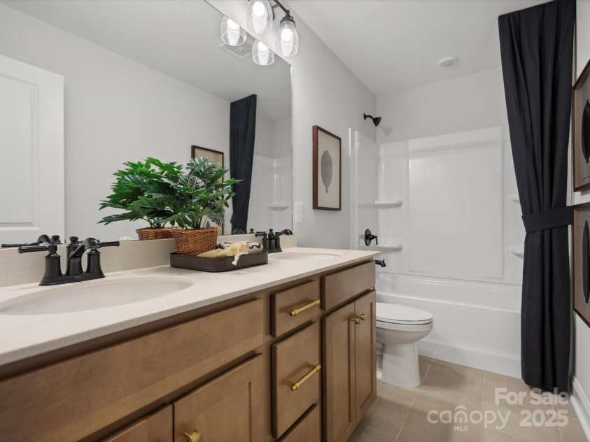 5061 Puddle Pond Road, Indian Trail, NC 28079.  MLS# CAR4302466, YatesRealty ID 29. Photo is of Model and for representational purposes only