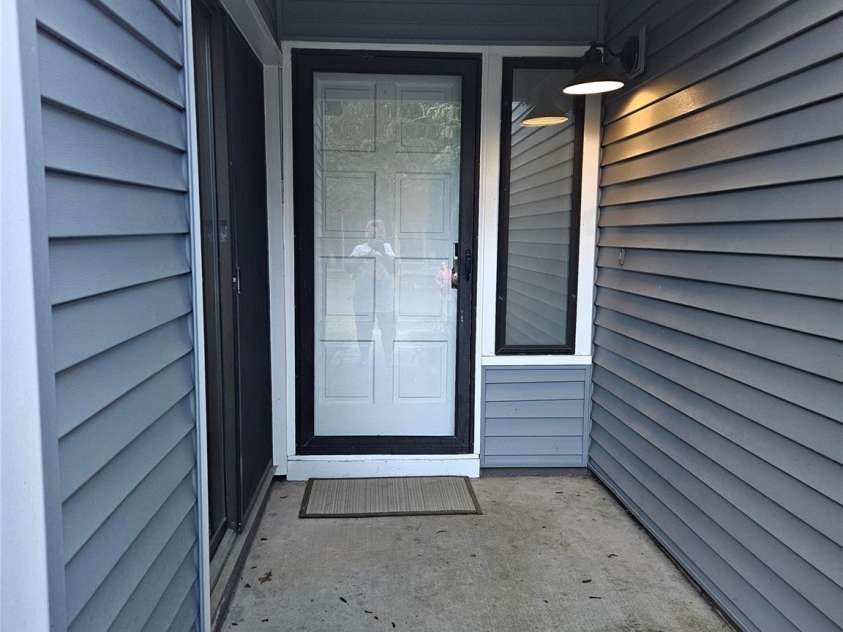 11216 Carmel Chace Drive, Charlotte, NC 28226.  MLS# CAR4252540, YatesRealty ID 29000. Front door covered area