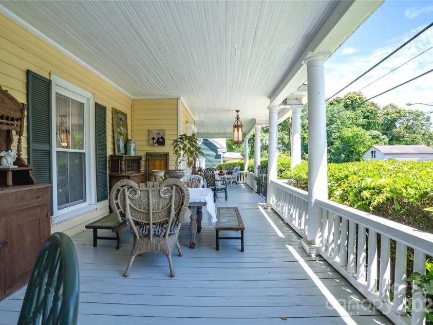 131 Lexington Road, Mocksville, NC 27028.  MLS# CAR4259844, YatesRealty ID 29003. Wrap-Around Porch