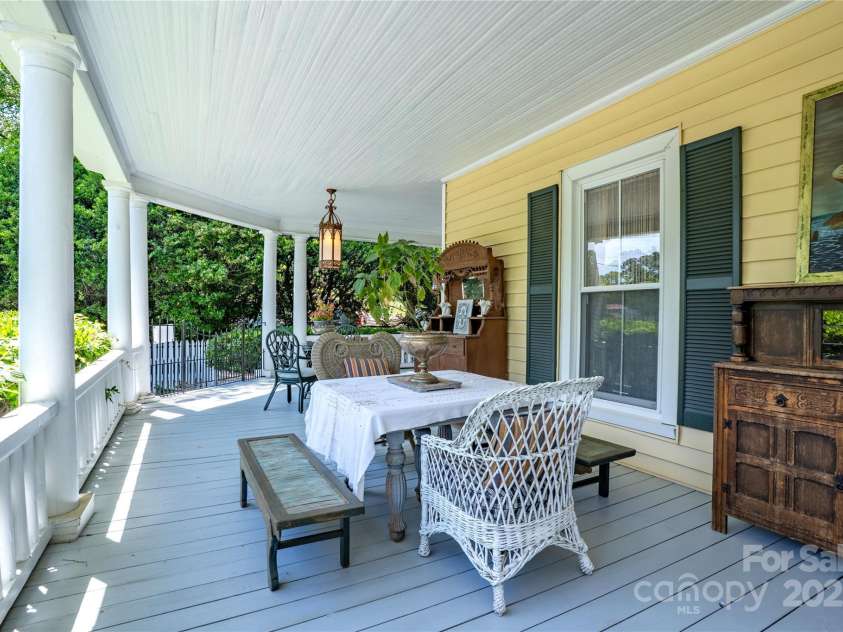 131 Lexington Road, Mocksville, NC 27028.  MLS# CAR4259844, YatesRealty ID 29003. Wrap-Around Porch