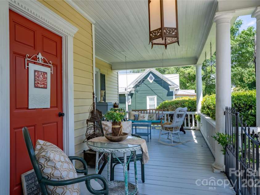 131 Lexington Road, Mocksville, NC 27028.  MLS# CAR4259844, YatesRealty ID 29003. Wrap-Around Porch