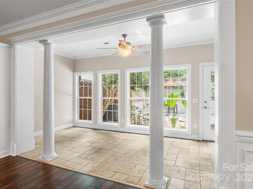 1143 21st Avenue, Hickory, NC 28601.  MLS# CAR4285530, YatesRealty ID 29007. Sunroom Overlooking Wooded common area