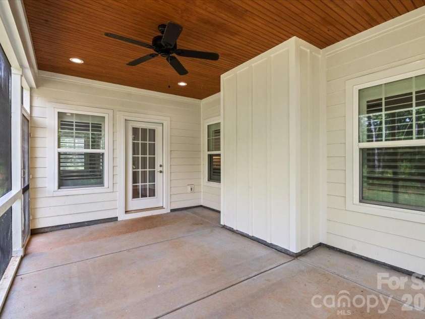 7575 Deer Track Drive, Denver, NC 28037.  MLS# CAR4391104, YatesRealty ID 29007. Lovely screened porch!