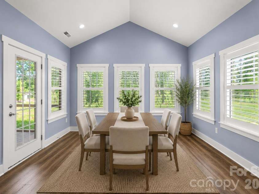 7575 Deer Track Drive, Denver, NC 28037.  MLS# CAR4391104, YatesRealty ID 29007. This area could be used as a dining room or sunroom, virtually staged