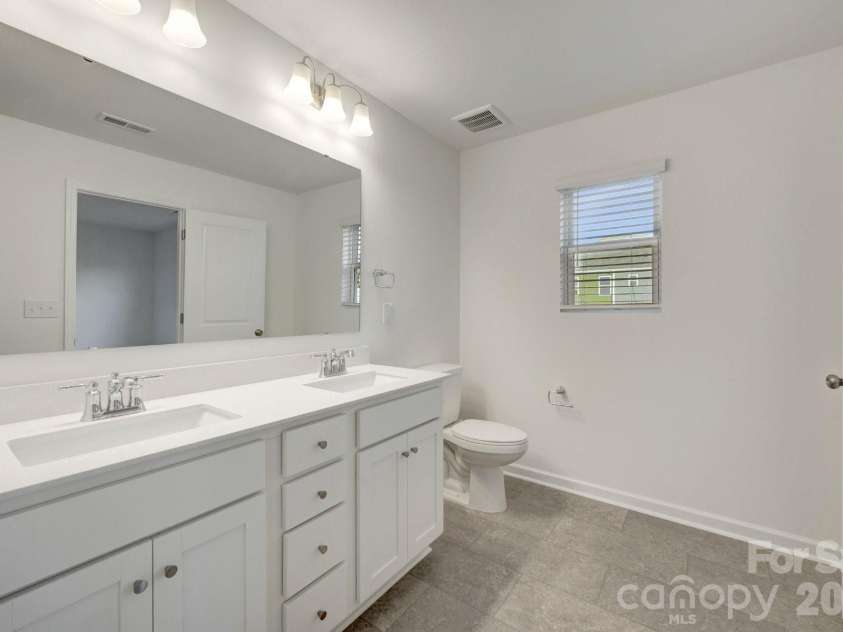 832 Earhart Street, Concord, NC 28027.  MLS# CAR4391048, YatesRealty ID 29012. Owner's suite