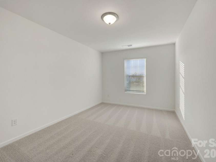 832 Earhart Street, Concord, NC 28027.  MLS# CAR4391048, YatesRealty ID 29012. Secondary bedroom