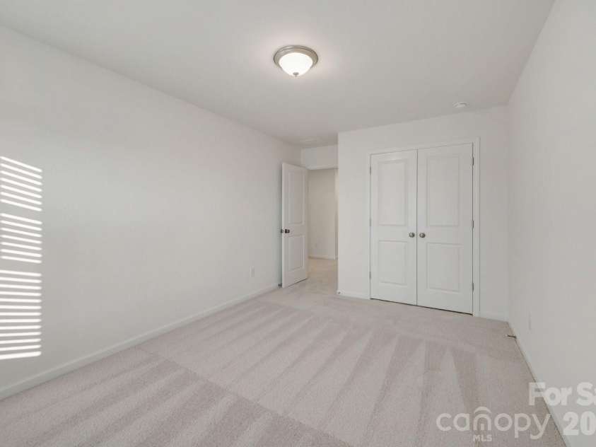 832 Earhart Street, Concord, NC 28027.  MLS# CAR4391048, YatesRealty ID 29012. Secondary bedroom