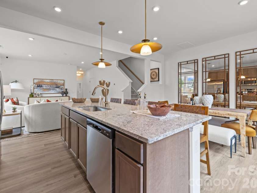 2206 Gladwyne Place, Charlotte, NC 28269.  MLS# CAR4391638, YatesRealty ID 29018. Representative Photo from Model - Kitchen and Dining Area