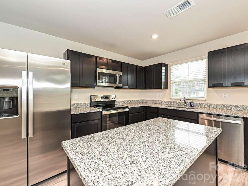 2037 Langer Street, Charlotte, NC 28214.  MLS# CAR4353707, YatesRealty ID 2902. Kitchen island