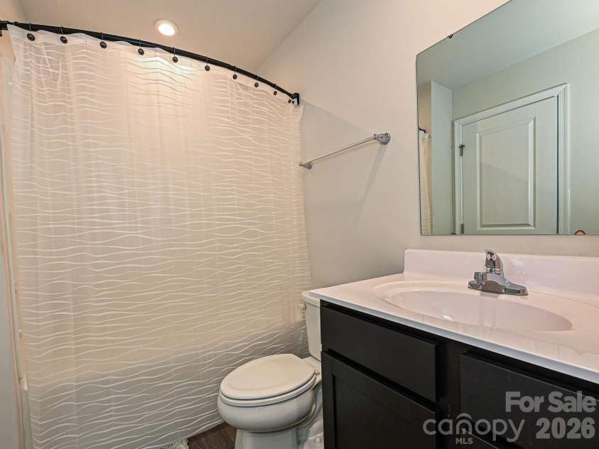 2037 Langer Street, Charlotte, NC 28214.  MLS# CAR4353707, YatesRealty ID 2902. Primary Bathroom