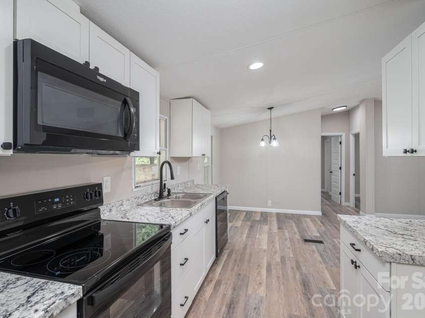 3462 Eaker Road, Cherryville, NC 28021.  MLS# CAR4390279, YatesRealty ID 29035. Kitchen looking into dining area