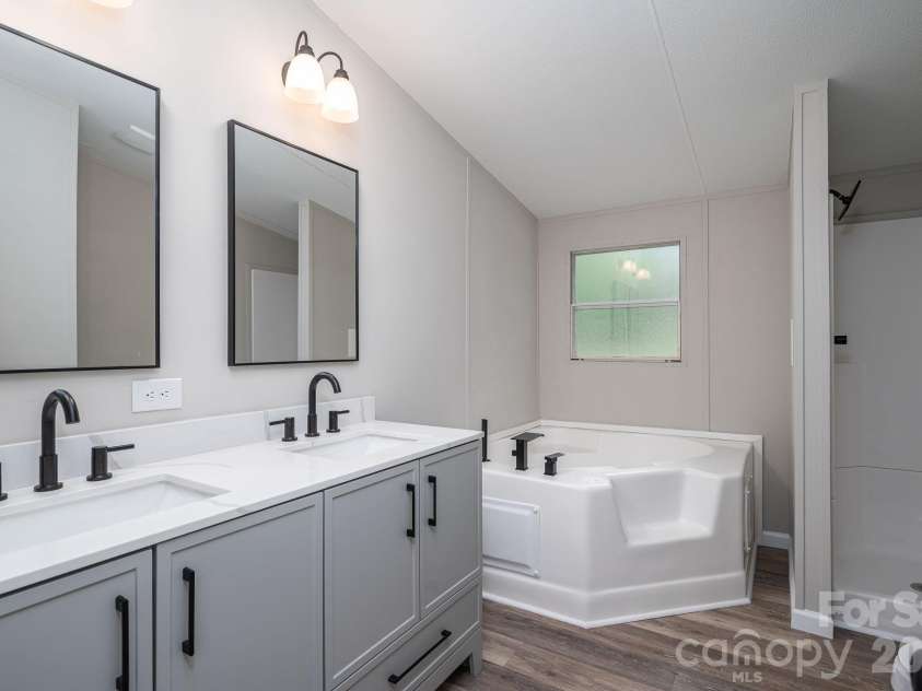 3462 Eaker Road, Cherryville, NC 28021.  MLS# CAR4390279, YatesRealty ID 29035. Primary bath with double sink