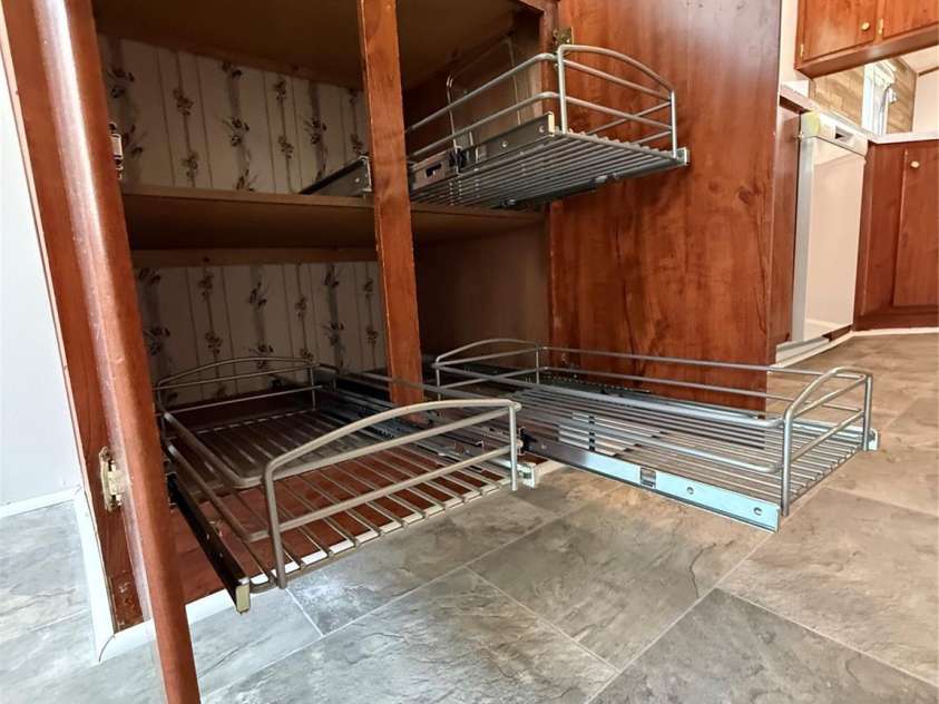 7050 Woodleaf Road, Woodleaf, NC 27054.  MLS# CAR4276614, YatesRealty ID 29035. Custom Cabinetry Storage