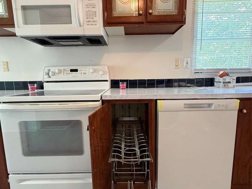 7050 Woodleaf Road, Woodleaf, NC 27054.  MLS# CAR4276614, YatesRealty ID 29035. Custom Cabinetry Storage