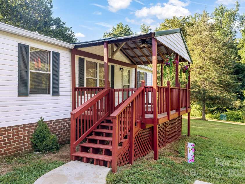 7050 Woodleaf Road, Woodleaf, NC 27054.  MLS# CAR4276614, YatesRealty ID 29035. Front Porch