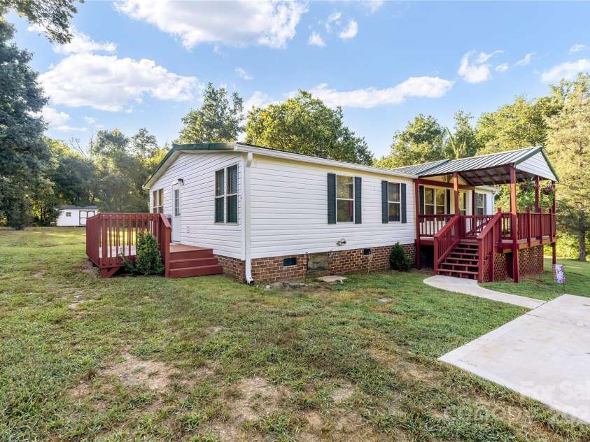 7050 Woodleaf Road, Woodleaf, NC 27054.  MLS# CAR4276614, YatesRealty ID 29035. Front & Side Porch