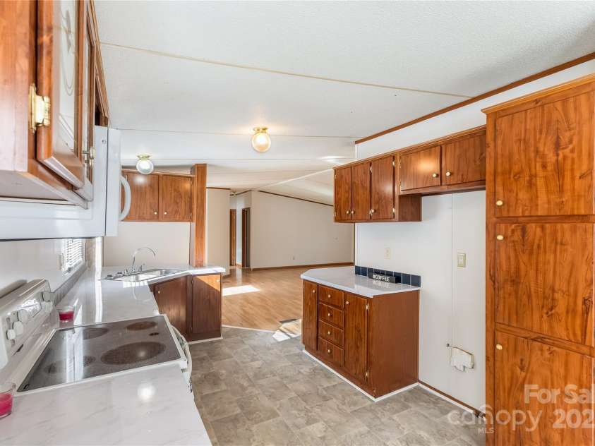 7050 Woodleaf Road, Woodleaf, NC 27054.  MLS# CAR4276614, YatesRealty ID 29035. Kitchen