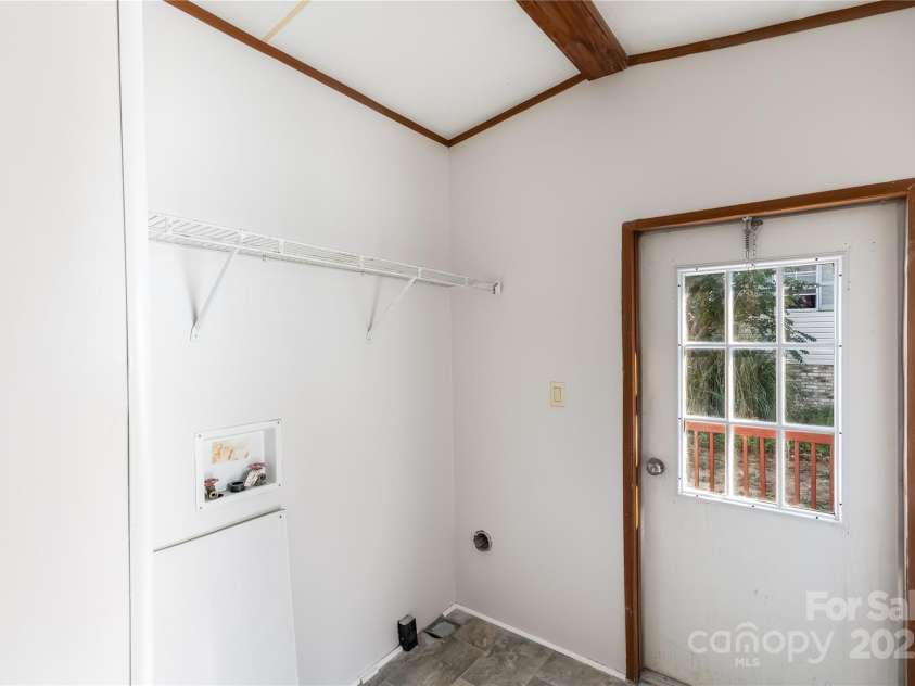 7050 Woodleaf Road, Woodleaf, NC 27054.  MLS# CAR4276614, YatesRealty ID 29035. Laundry & Mudroom