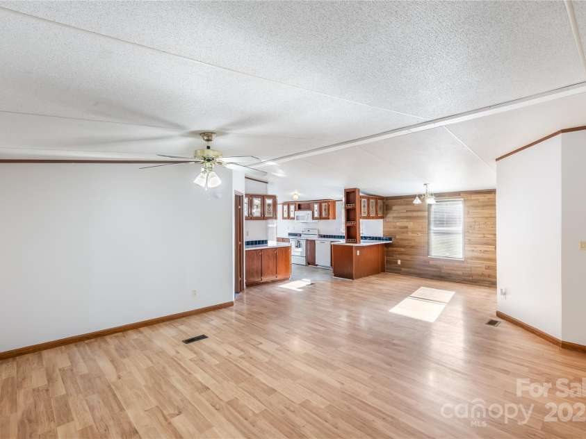 7050 Woodleaf Road, Woodleaf, NC 27054.  MLS# CAR4276614, YatesRealty ID 29035. Living Room