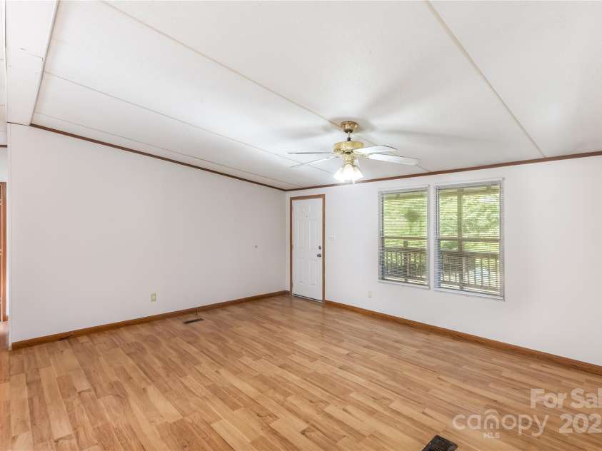 7050 Woodleaf Road, Woodleaf, NC 27054.  MLS# CAR4276614, YatesRealty ID 29035. Living Room