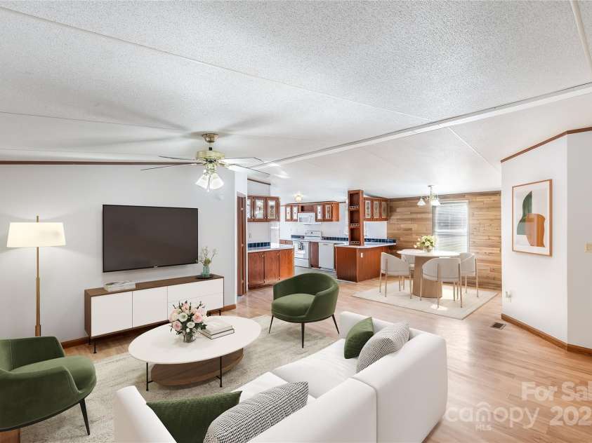 7050 Woodleaf Road, Woodleaf, NC 27054.  MLS# CAR4276614, YatesRealty ID 29035. Living Room- Virtually Staged