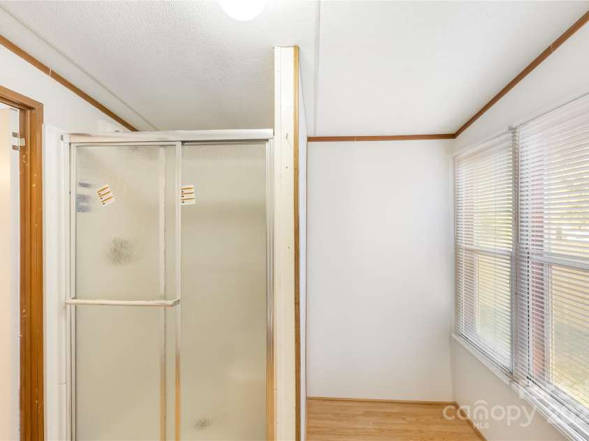 7050 Woodleaf Road, Woodleaf, NC 27054.  MLS# CAR4276614, YatesRealty ID 29035. Primary Bath