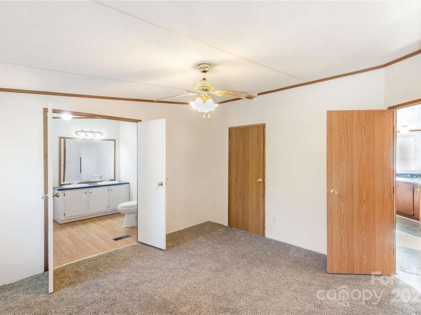 7050 Woodleaf Road, Woodleaf, NC 27054.  MLS# CAR4276614, YatesRealty ID 29035. Primary Bedroom