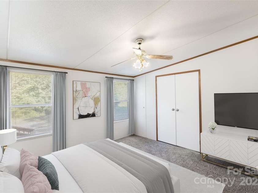 7050 Woodleaf Road, Woodleaf, NC 27054.  MLS# CAR4276614, YatesRealty ID 29035. Primary Bedroom- Virtually Staged