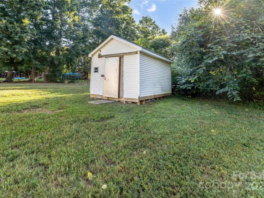 7050 Woodleaf Road, Woodleaf, NC 27054.  MLS# CAR4276614, YatesRealty ID 29035. Workshop/ Storage Shed