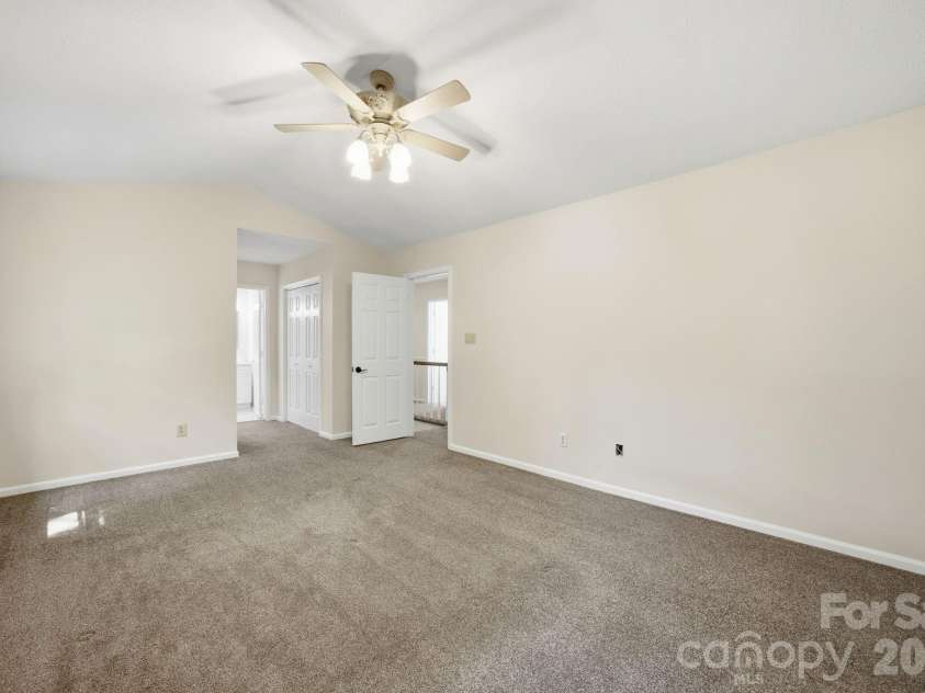 2011 Windlock Drive, Charlotte, NC 28270.  MLS# CAR4362953, YatesRealty ID 29038. Primary Bedroom 2011 Windlock DrCharlotte, NC 28270