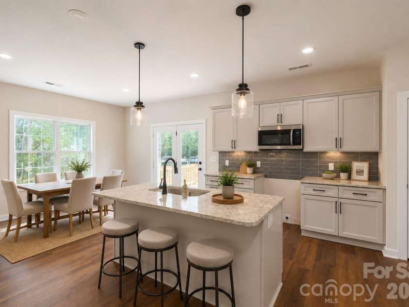 17 Tennyson Drive, Taylorsville, NC 28681.  MLS# CAR4371136, YatesRealty ID 29041. Virtually Staged Kitchen and Dining Area